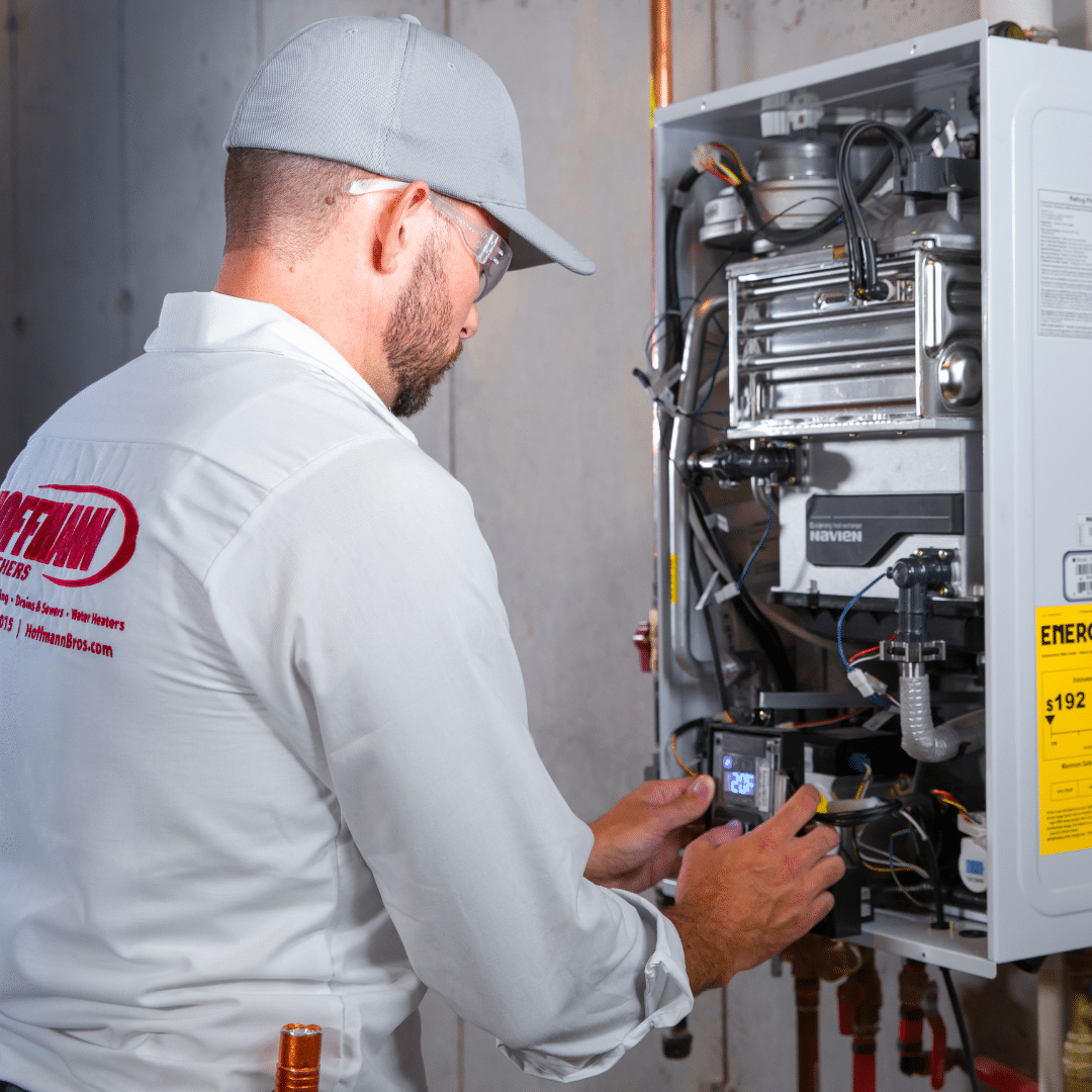 Nashville Hoffmann's expert doing maintenance work on a water heater